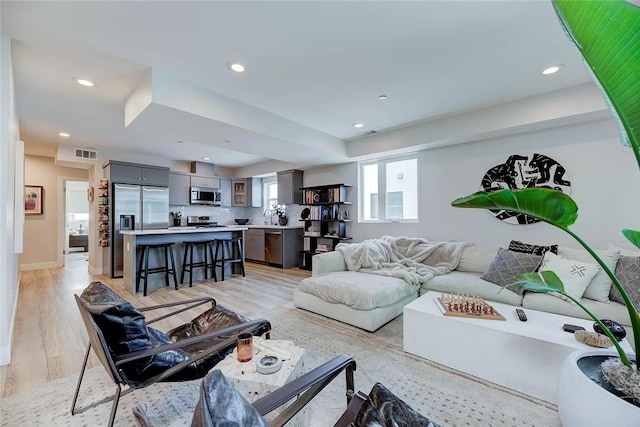 2151 S W View St, Los Angeles, CA 90016 - living room with recessed lighting and light wood finished floors
