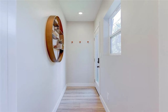 2151 S W View St, Los Angeles, CA 90016 - doorway to outside featuring light wood-type flooring and recessed lighting