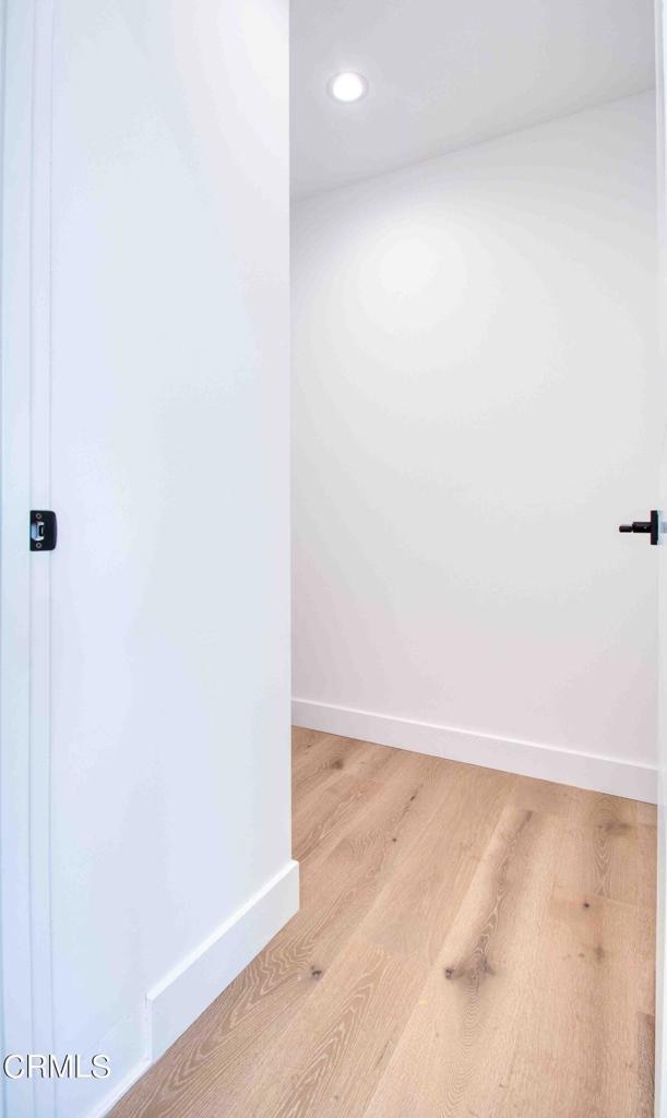 hallway featuring light hardwood / wood-style floors