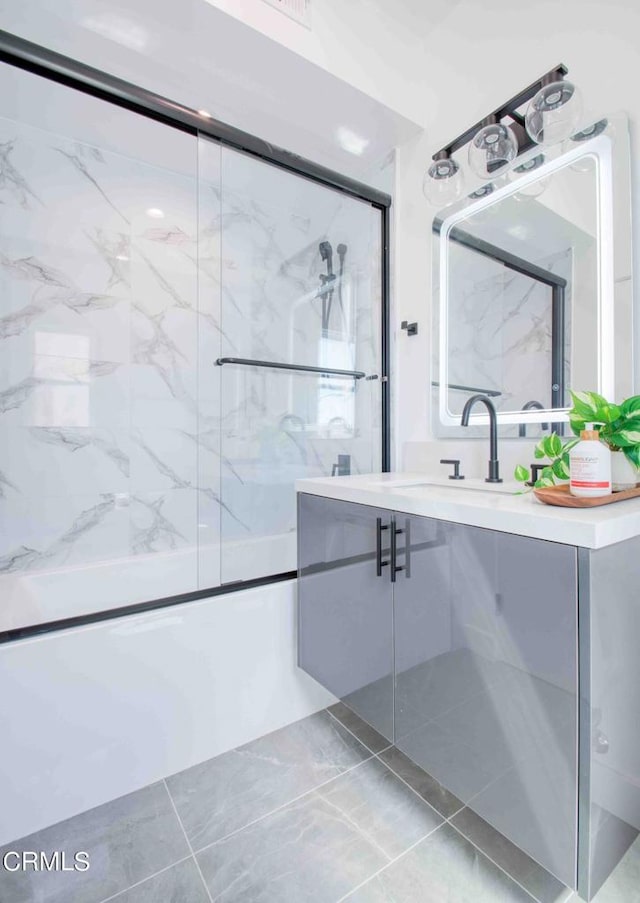 bathroom featuring vanity and tile patterned flooring