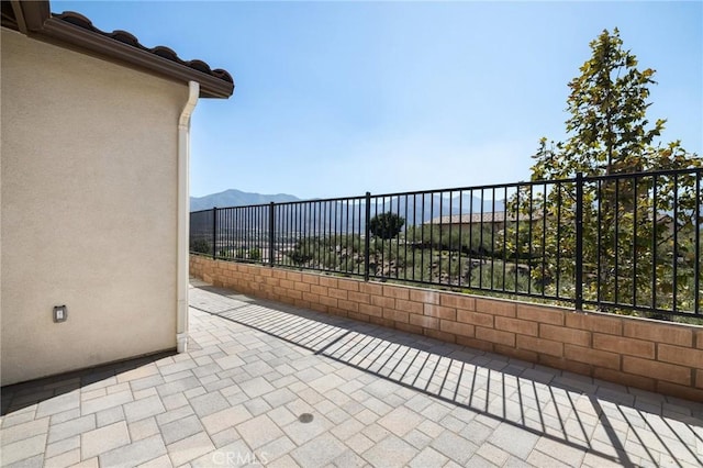 view of patio with a mountain view