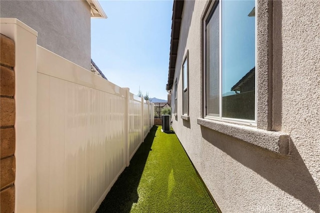 view of property exterior featuring central air condition unit