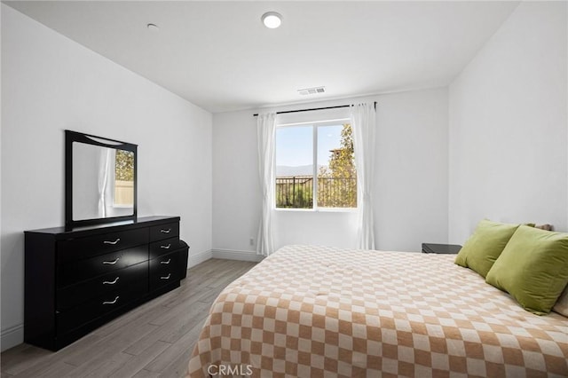 bedroom featuring light hardwood / wood-style floors