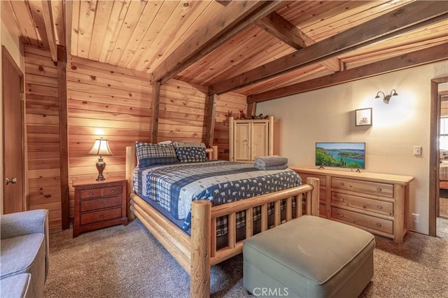 bedroom with vaulted ceiling with beams, dark carpet, wooden ceiling, and wood walls