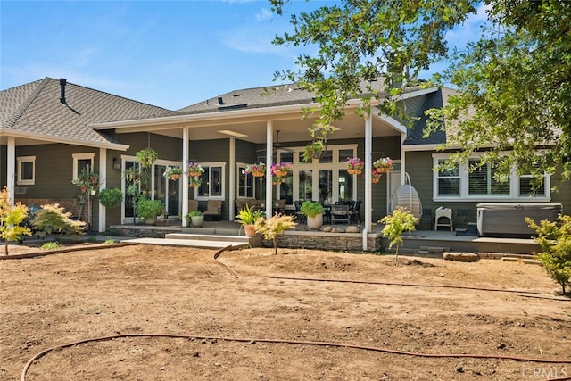 rear view of property featuring a patio area