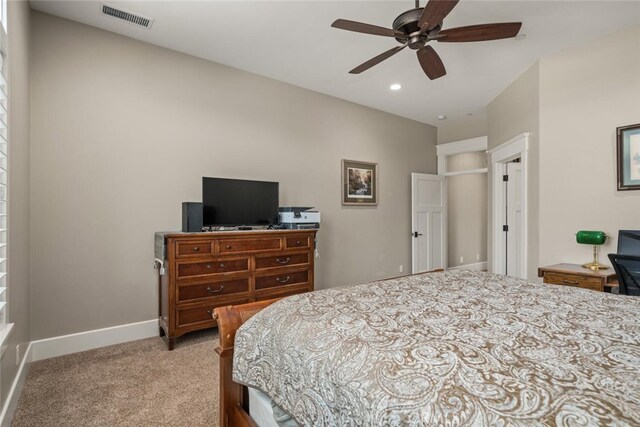 bedroom featuring recessed lighting, carpet flooring, baseboards, ceiling fan, and visible vents