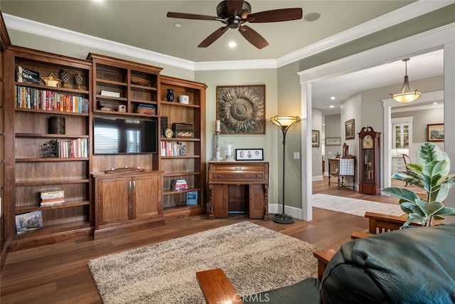 living room featuring recessed lighting, ornamental molding, baseboards, a ceiling fan, and wood finished floors