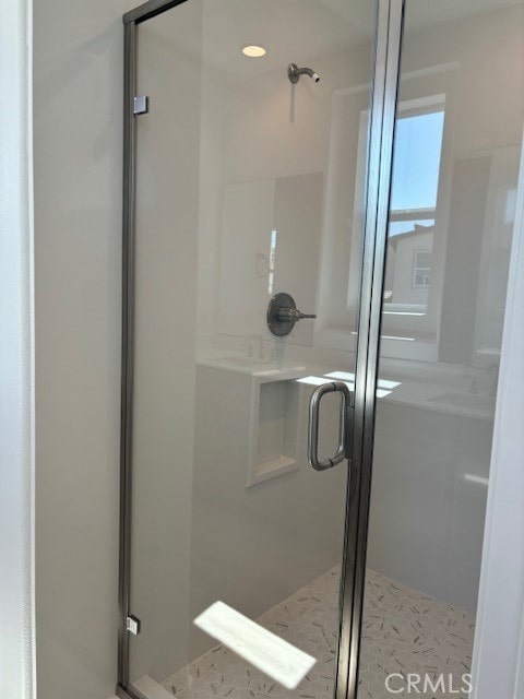 bathroom featuring tile patterned floors and walk in shower