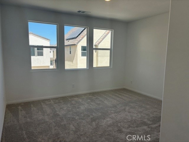 view of carpeted spare room