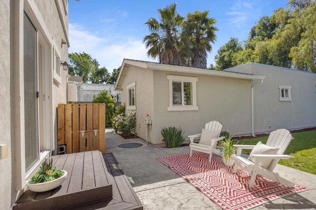 back of property featuring a patio area