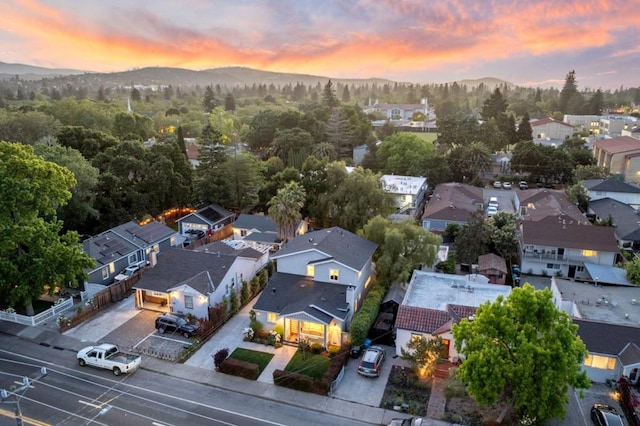 aerial view at dusk with a mountain view