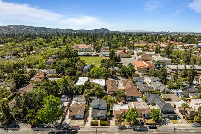 drone / aerial view featuring a mountain view