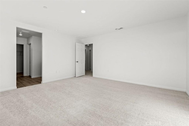 unfurnished room featuring carpet floors