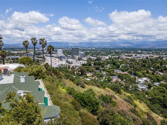 drone / aerial view featuring a mountain view