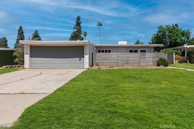 single story home featuring a front lawn and a garage