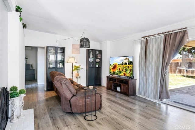 sitting room with hardwood / wood-style floors