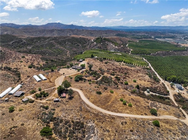 drone / aerial view with a rural view and a mountain view