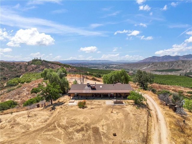 bird's eye view with a rural view and a mountain view