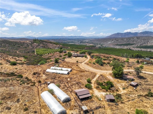 bird's eye view featuring a rural view and a mountain view