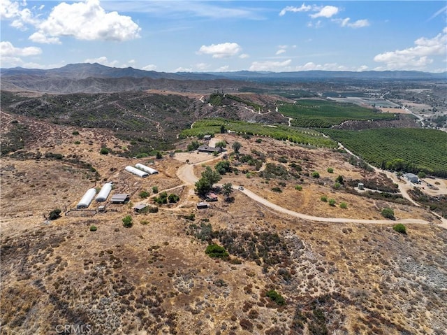 aerial view featuring a rural view and a mountain view