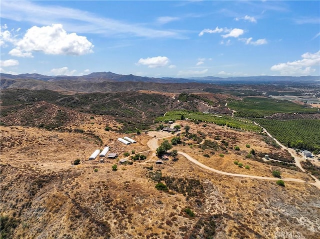 drone / aerial view featuring a mountain view