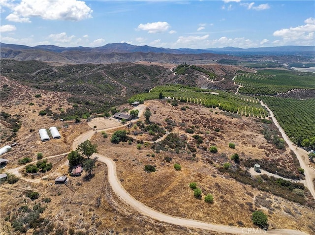 bird's eye view featuring a rural view and a mountain view