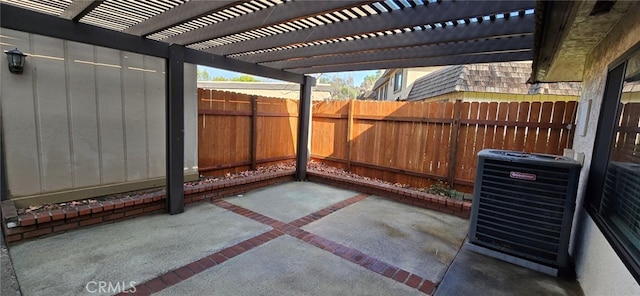 view of patio featuring central air condition unit and a pergola