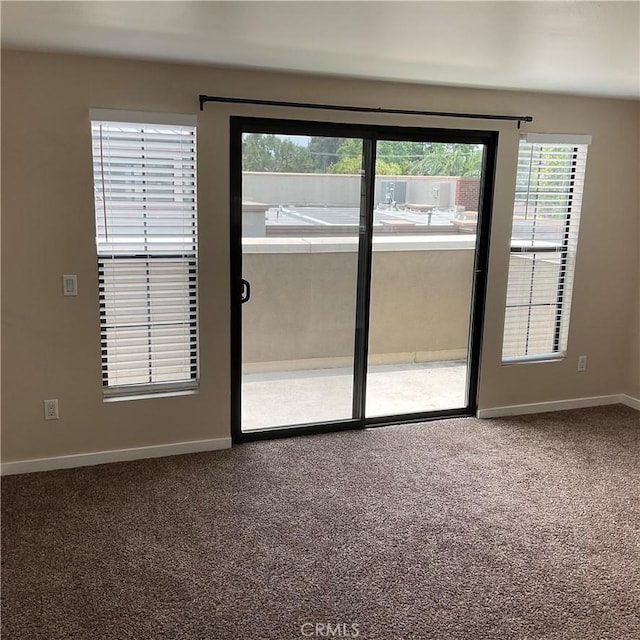 view of carpeted spare room