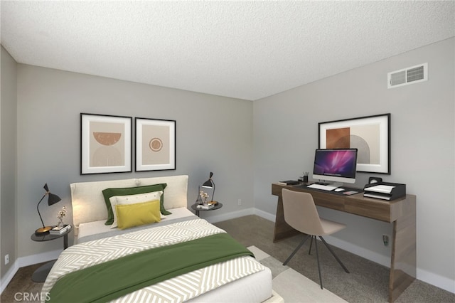 carpeted bedroom with a textured ceiling