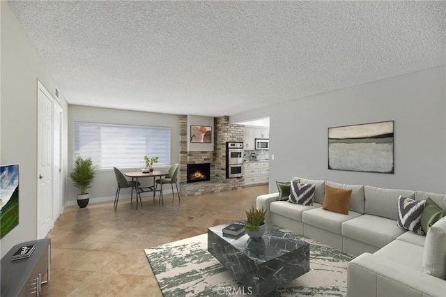 tiled living room featuring a textured ceiling and a brick fireplace