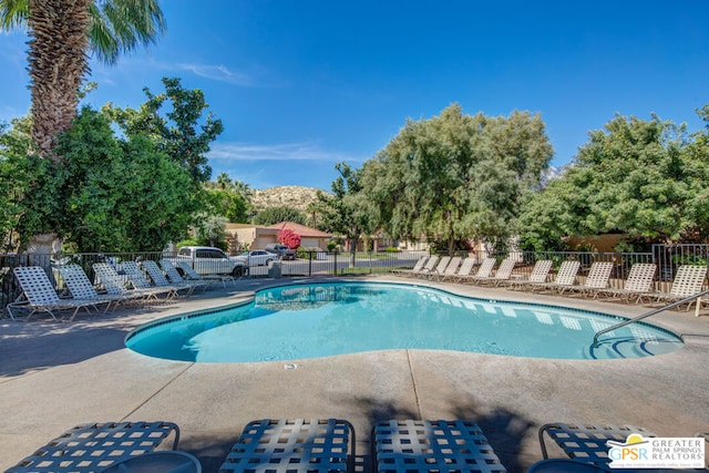 view of pool featuring a patio area