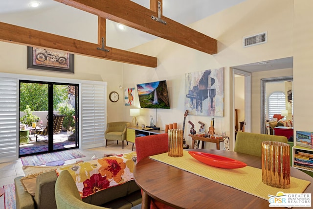 tiled dining room featuring beam ceiling and high vaulted ceiling