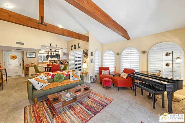 living room with beamed ceiling, light tile patterned floors, and high vaulted ceiling