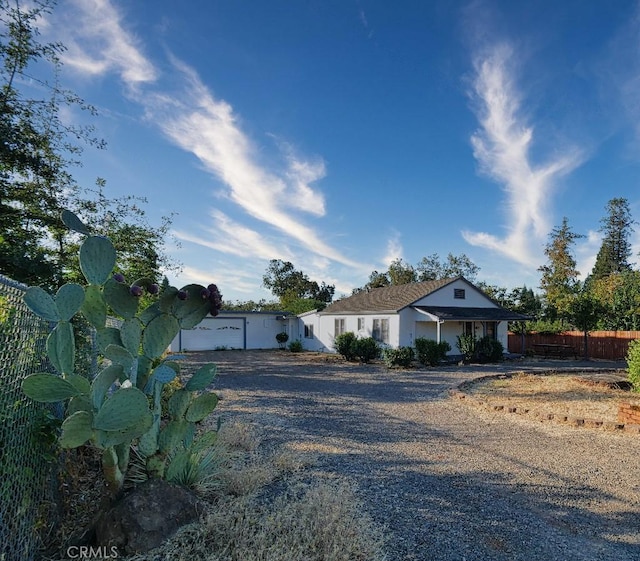 single story home featuring a garage