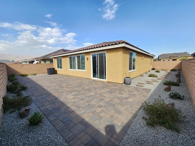 back of house featuring a patio