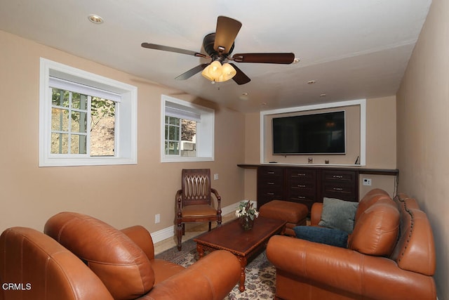 living room with ceiling fan