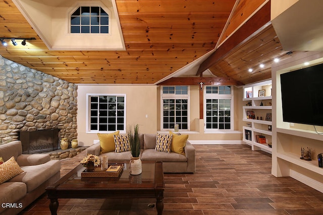 living room with a fireplace, lofted ceiling with beams, and wooden ceiling