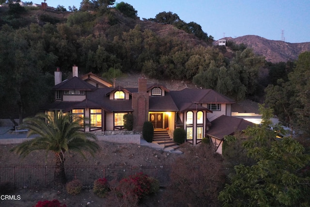 view of front facade featuring a mountain view