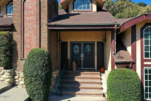 property entrance with covered porch