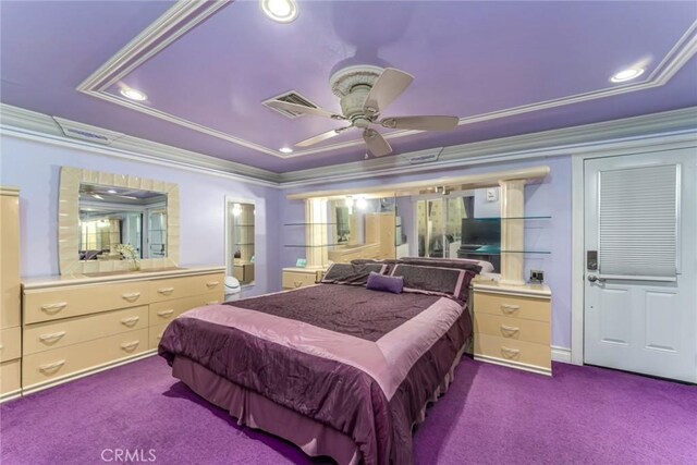 carpeted bedroom featuring ceiling fan, a raised ceiling, and ornamental molding