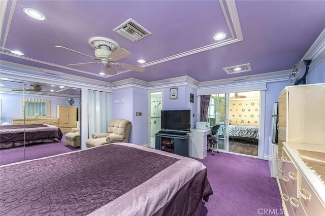 bedroom featuring ceiling fan, carpet flooring, ornamental molding, and a raised ceiling