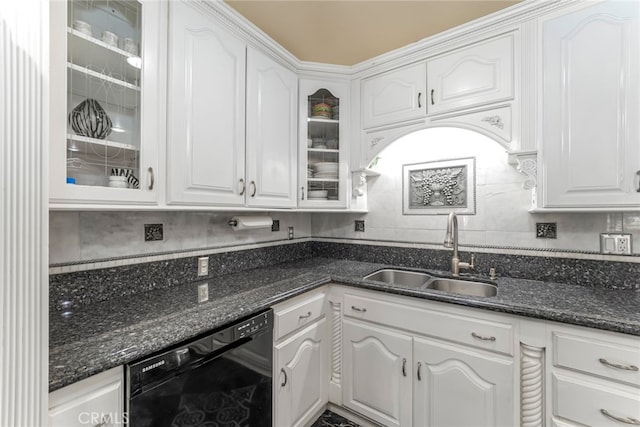 kitchen featuring white cabinets, black dishwasher, and sink