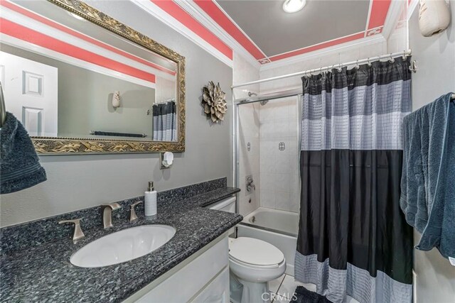 full bathroom featuring shower / tub combo with curtain, toilet, tile patterned flooring, vanity, and ornamental molding