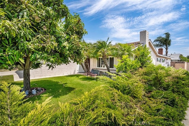 exterior space featuring a front lawn