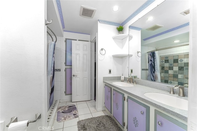 bathroom featuring double vanity and tile patterned floors