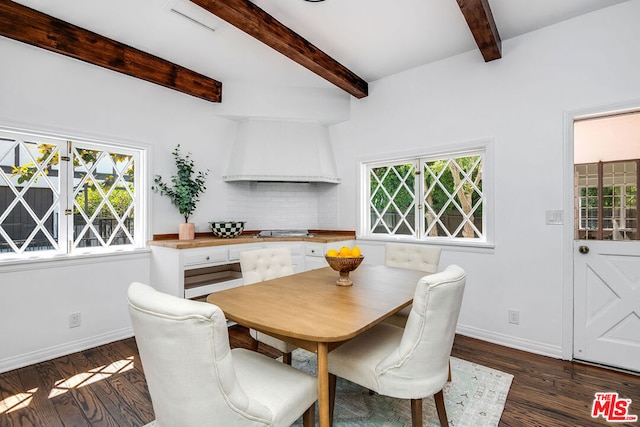 dining space with dark wood-type flooring, beamed ceiling, and a healthy amount of sunlight