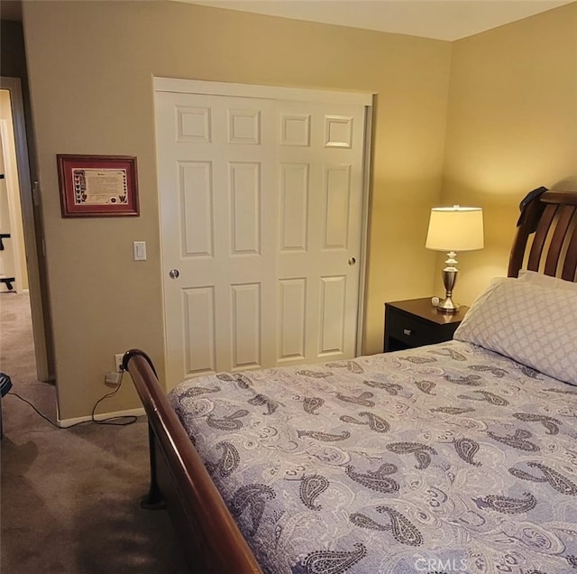 carpeted bedroom with a closet