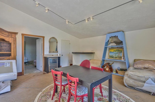 dining room with lofted ceiling