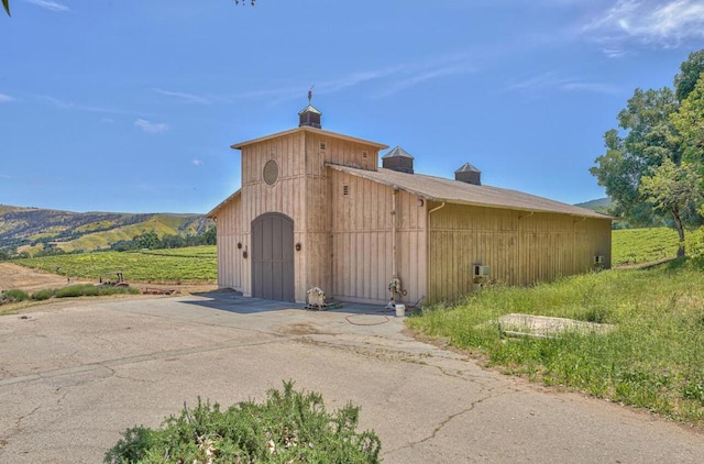 exterior space featuring a mountain view