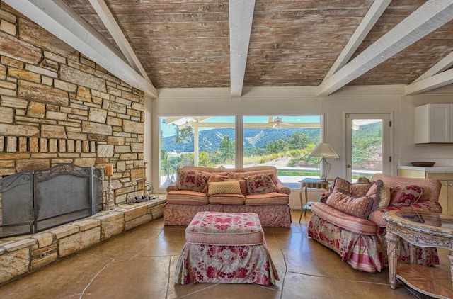 living room featuring wood ceiling, a mountain view, and vaulted ceiling with beams